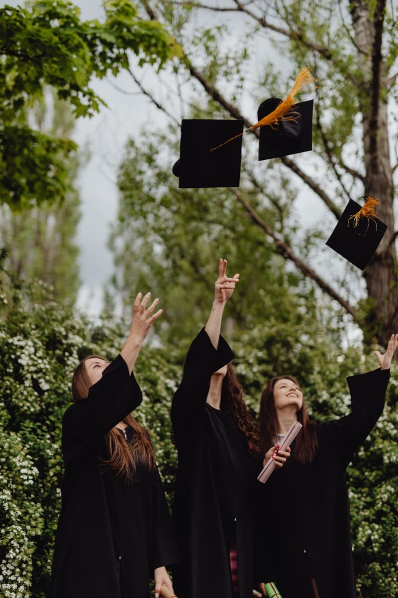 Graduates celebrating after completing their studies